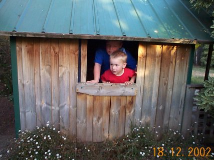 Kurt & Nathan in the cubby at our new home Dec 2002