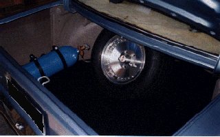 Boot/trunk shot showing nitrous oxide bottle & spare wheel